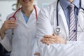 Doctors man and woman ready to examine patient