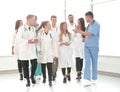 Doctors of the medical center discussing important issues in the hospital corridor. Royalty Free Stock Photo