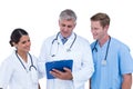 Doctors and nurse discussing over notes Royalty Free Stock Photo