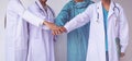 Doctors and Nurses coordinate hands. Concept Teamwork Royalty Free Stock Photo