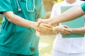Doctors and nurses coordinate hands. Royalty Free Stock Photo