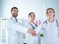 Doctors and nurses coordinate hands. Concept Teamwork in hospital for success work and trust in team Royalty Free Stock Photo