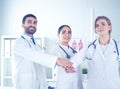 Doctors and nurses coordinate hands. Concept Teamwork in hospital for success work and trust in team Royalty Free Stock Photo