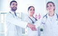 Doctors and nurses coordinate hands. Concept Teamwork in hospital for success work and trust in team Royalty Free Stock Photo