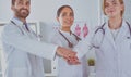 Doctors and nurses coordinate hands. Concept Teamwork in hospital for success work and trust in team Royalty Free Stock Photo