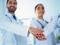 Doctors and nurses coordinate hands. Concept Teamwork in hospital for success work and trust in team Royalty Free Stock Photo