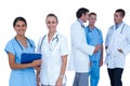 Doctors and nurses discussing over notes Royalty Free Stock Photo