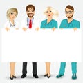 Doctors and nurses holding a blank billboard Royalty Free Stock Photo