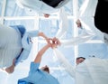 Doctors and nurses in a medical team stacking hands Royalty Free Stock Photo