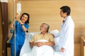 Doctors and nurses are taking care of patients in special hospital rooms Royalty Free Stock Photo