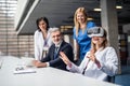 Doctors and pharmaceutical sales representative using VR goggles. Royalty Free Stock Photo
