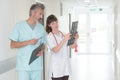 Doctors pointing something out on x-ray Royalty Free Stock Photo
