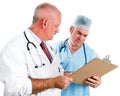 Doctors Review Patient Chart Royalty Free Stock Photo