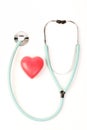 Doctors stethoscope and one red heart on white background Royalty Free Stock Photo