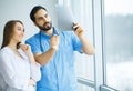 Doctors team examining a patient`s x-ray Royalty Free Stock Photo