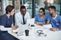 Doctors, teamwork and planning for healthcare in office with laptop, documents and research. Nurses, collaboration and