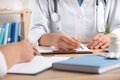 Doctors working at desk in office. Medical service Royalty Free Stock Photo