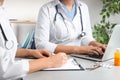 Doctors working at desk in office. Medical service Royalty Free Stock Photo