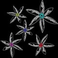 Five vibrant flowers against a dark backdrop Royalty Free Stock Photo