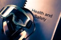 Document with earphones and goggles Royalty Free Stock Photo