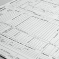 A document featuring various rows and columns with printed text, likely resembling