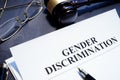 Document about Gender Discrimination and gavel Royalty Free Stock Photo