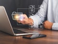 Businessman using finger touch security icon on the virtual screen for unlocking
