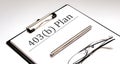 Document with sign 403b plan with pen and glasses .Retirement concept Royalty Free Stock Photo