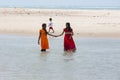 Documentary editorial. DANUSHKODI, PAMBAN ISLAND, TAMIL NADU, INDIA - March circa, 2018. Unidentified young women girl couple taki