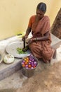 Documentary editorial image. An unidentified Indian woman cooker in the street