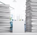 Documentation. A stack of white papers lie on a desk in an office room.