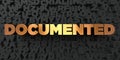 Documented - Gold text on black background - 3D rendered royalty free stock picture