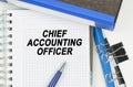 Among the documents, folders, a notebook with the inscription - CHIEF ACCOUNTING OFFICER
