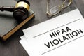 Documents about HIPAA violation and gavel in the court