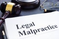 Documents about Legal Malpractice in a court. Royalty Free Stock Photo