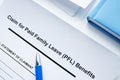 Documents for paid family leave PFL benefits. Royalty Free Stock Photo