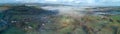 Doddiscombsleigh aerial panorama. Misty countryside Royalty Free Stock Photo