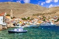 Dodecanese. traditional greek island Halki with colorful houses and emerald sea. Dodecanese Royalty Free Stock Photo