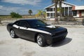 Dodge Hemi Challenger RT parked at abandoned building