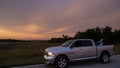 Dodge Ram 1500 Hemi with kayak in the countryside at dawn