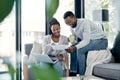 Doesnt it feel good to get rid of debt. a young couple going through paperwork at home. Royalty Free Stock Photo