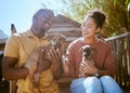 Dog, animal shelter and rescue with a black couple holding a puppy for adoption at a welfare kennel. Help, canine and Royalty Free Stock Photo