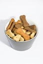 Dog biscuits in a bowl. Royalty Free Stock Photo