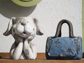 Dog and blue female bag sculpture detail Royalty Free Stock Photo