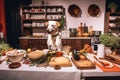 dog chef preparing a variety of ingredients and tools for cooking demonstration, with full view of audience Royalty Free Stock Photo