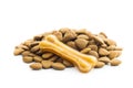 Dog chew bone and dry kibble dog food. Royalty Free Stock Photo