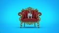 Dog with crown in a chair. Royalty Free Stock Photo