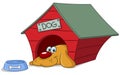 Dog in doghouse Royalty Free Stock Photo
