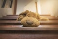 Dog doll abandoned at the stairs Royalty Free Stock Photo