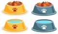Dog dry food bowl. Bone crisps. Yellow and gray pet bowl with dry food. Dry dog food bowl. Royalty Free Stock Photo